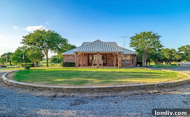 Fort Worth's Luxury Landscape: Expansive Estates Flourish in Texas' Fastest-Growing City 12 An expansive aerial view of the 200-acre ranch at 4721 Rendon Road, featuring open fields and lush greenery.