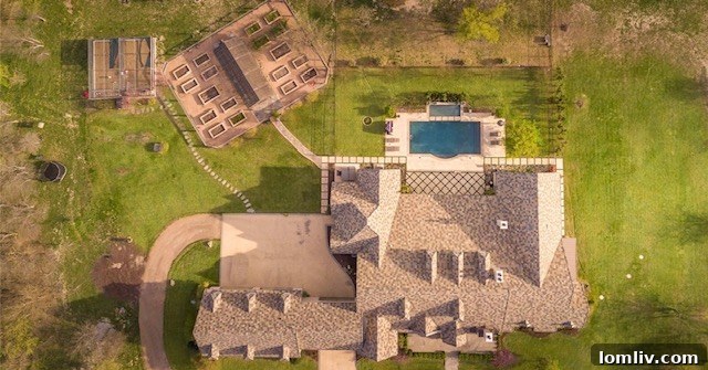 Fort Worth's Luxury Landscape: Expansive Estates Flourish in Texas' Fastest-Growing City 4 A gourmet chef's kitchen featuring high-end appliances and a large island, perfect for entertaining.