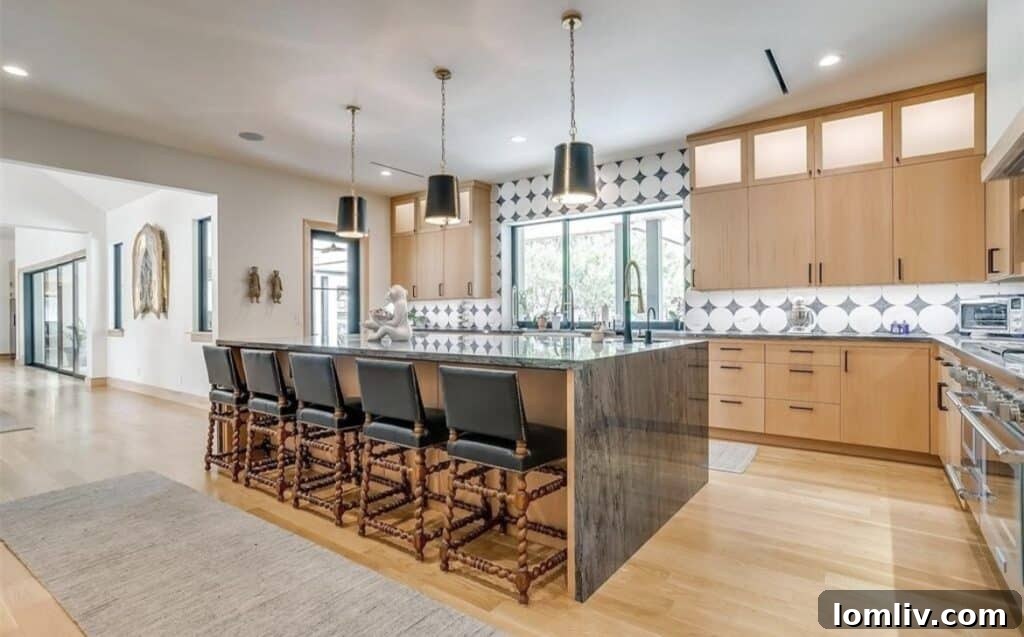 Fort Worth's Luxury Landscape: Expansive Estates Flourish in Texas' Fastest-Growing City 9 A stunning aerial view of the Lazy H Ranch estate, highlighting the main residence, pool, and extensive grounds.