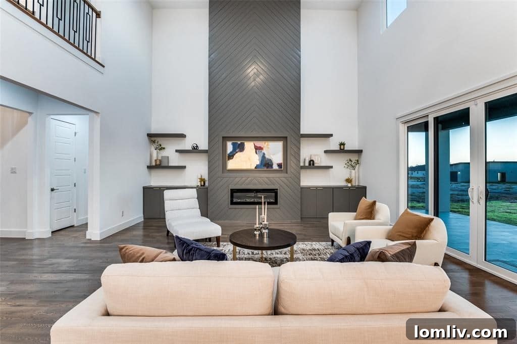 Modern living room with high ceilings and abundant natural light in a Red Oak new build