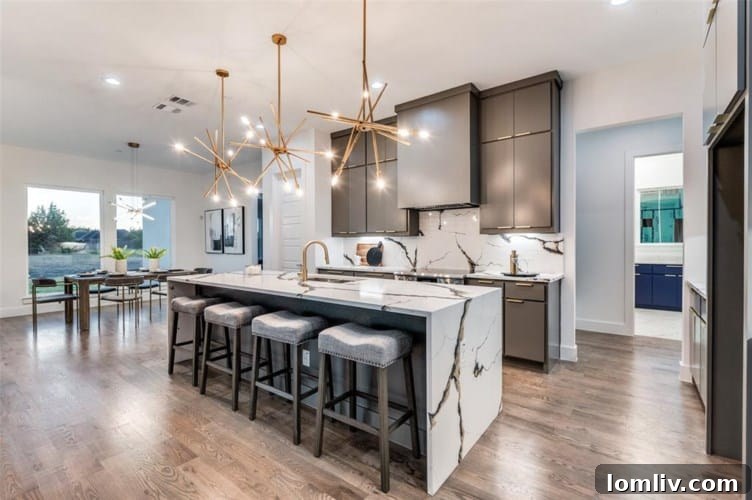 Open concept kitchen and dining area with contemporary finishes, perfect for entertaining