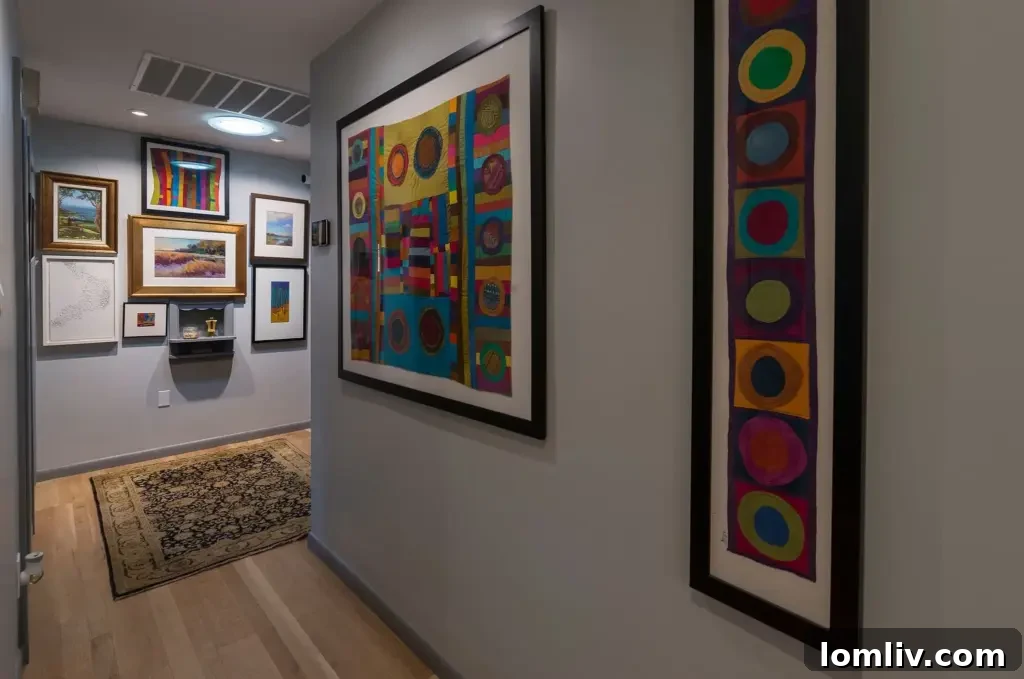 Wynnewood North Midcentury: A Tour of Its Irresistible Charms 12 Close-up of an elegant picture rail system, allowing for flexible and damage-free display of artwork and decorative items.