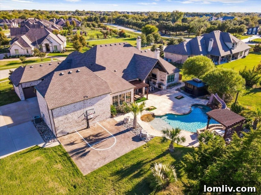 Black Hills Willow Springs Heath The City of Many Aliases 4 View of the expansive backyard and the exterior of the home, highlighting the vast space for outdoor activities and private enjoyment in Heath, TX.