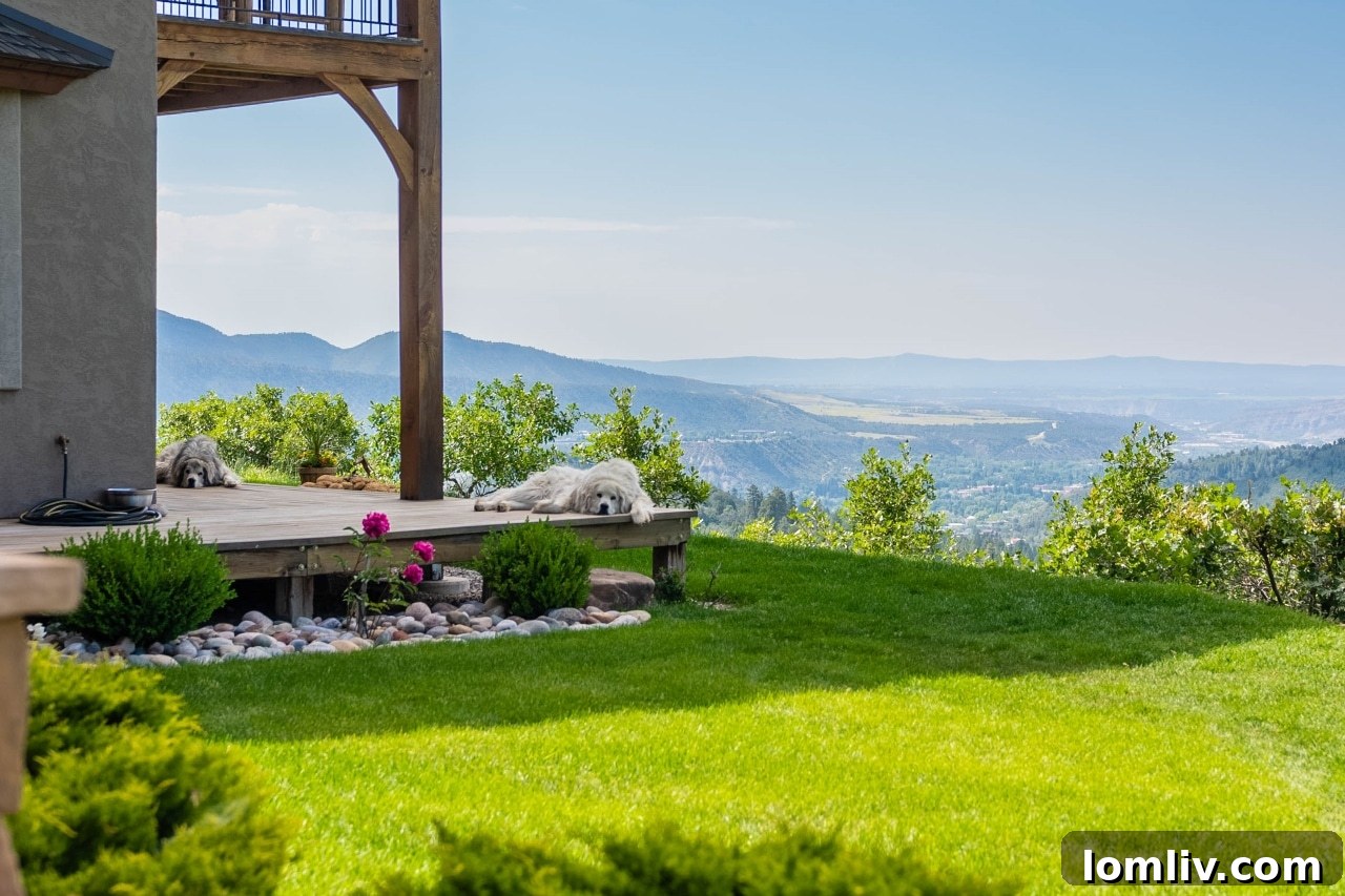 Master bedroom with panoramic mountain views at Mountain Memories.