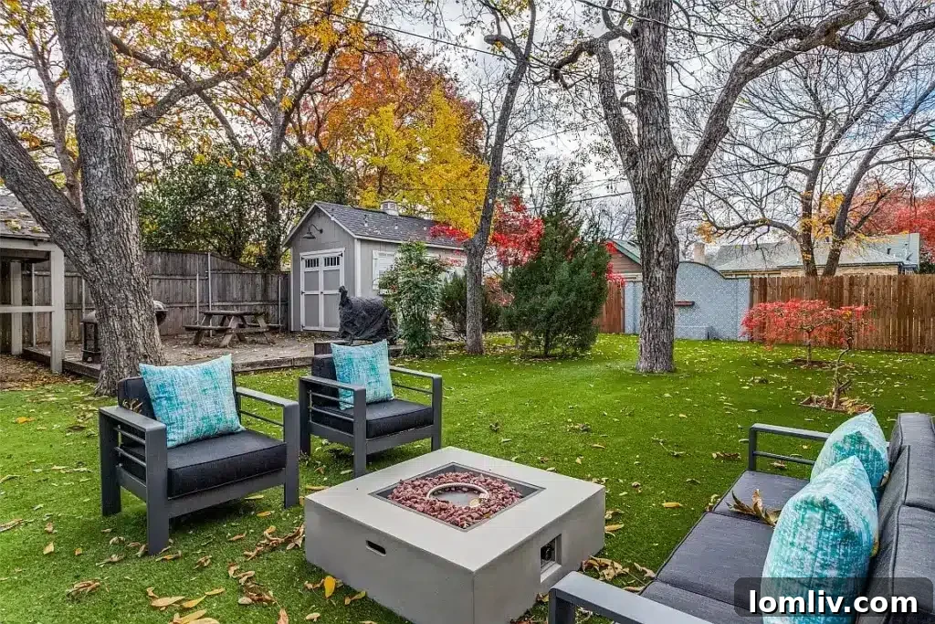 Expansive backyard with mature trees, a well-maintained lawn, and plenty of open space.
