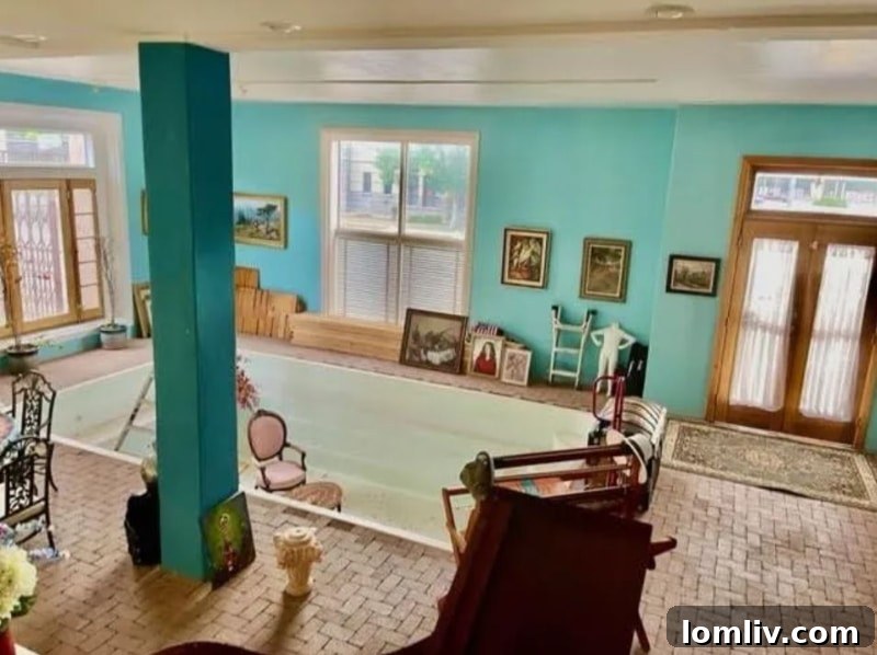 Converted indoor pool area used as a sitting lounge