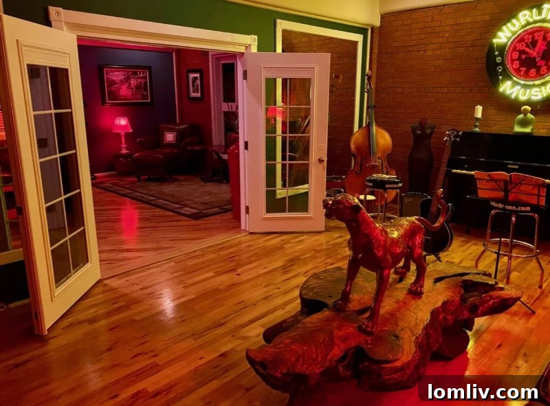 Music room with piano and dark wood finishes