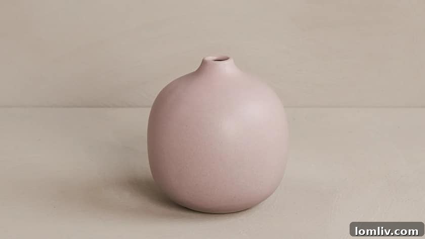 Still Time to Be a Holiday Hero Shop Local 3 Christiane Perrochon ceramic bud vase in a minimalist setting