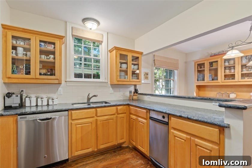 Bright and spacious living area inside the duplex, featuring classic flooring and ample natural light.