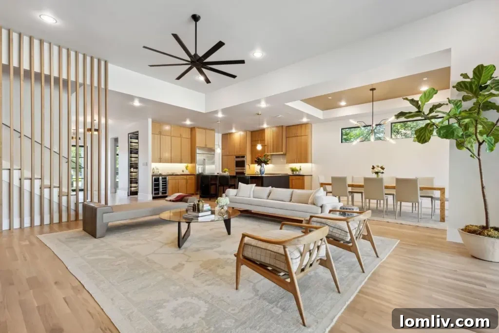 Spacious living room with high ceilings and abundant natural light