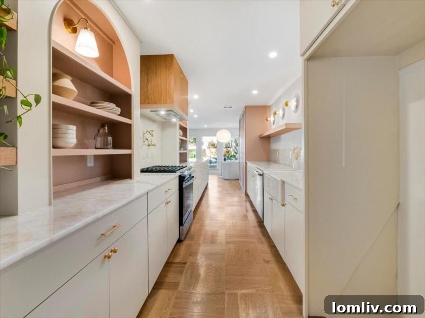 Extended galley kitchen at 10035 Edgecove Drive, maintaining original plumbing
