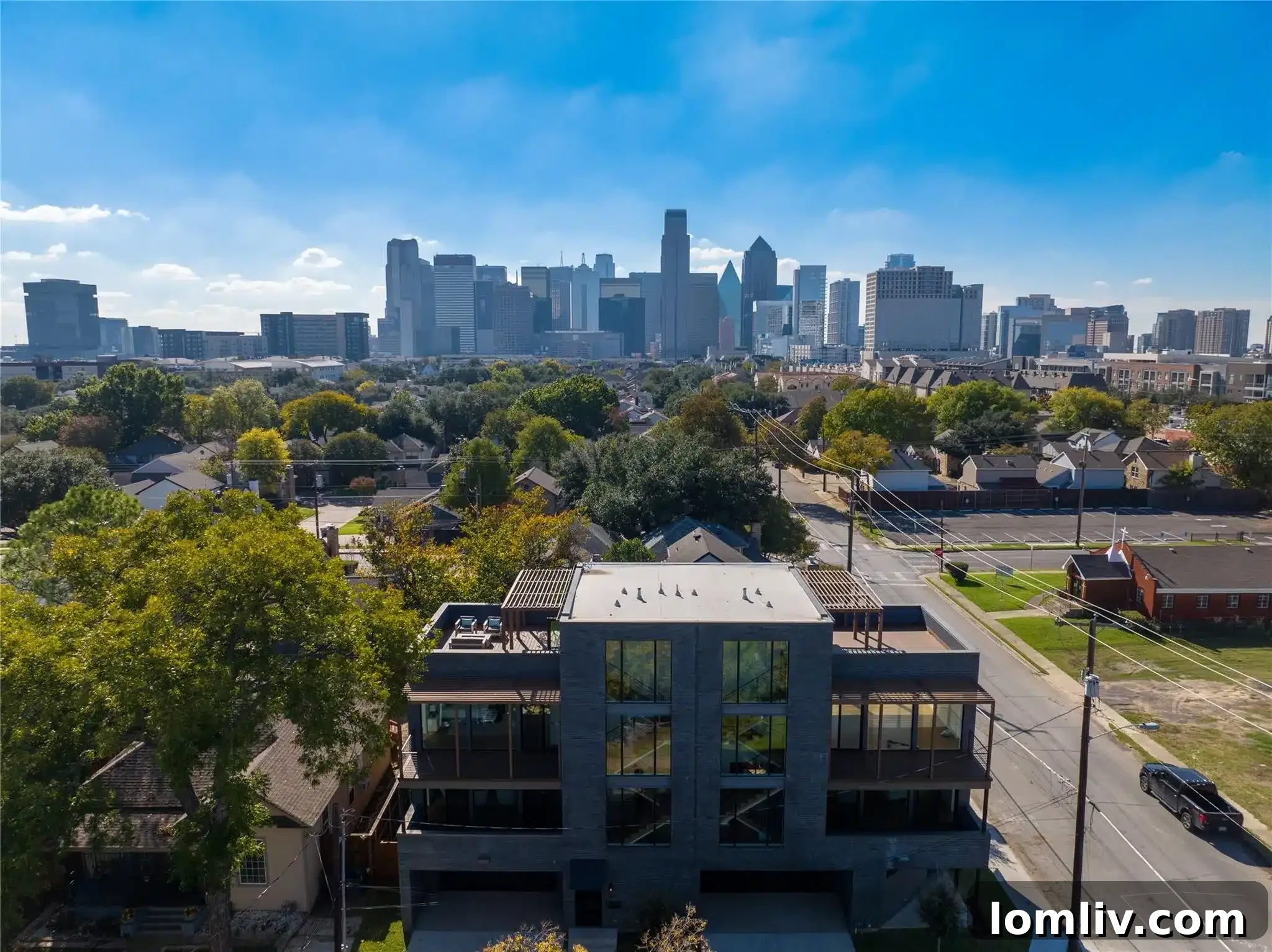 Luxury home exterior with views of Dallas skyline