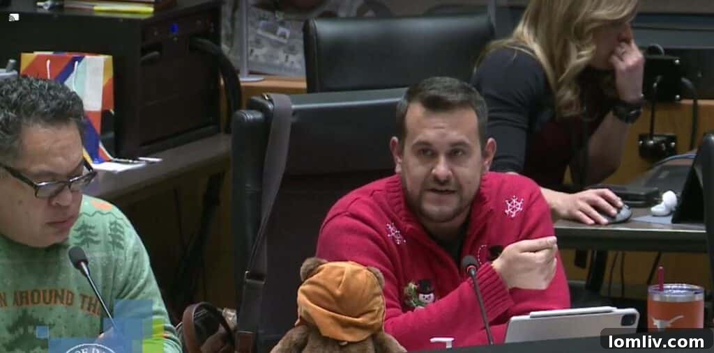 Dallas City Council members Omar Narvaez, left, and Adam Bazaldua listening attentively