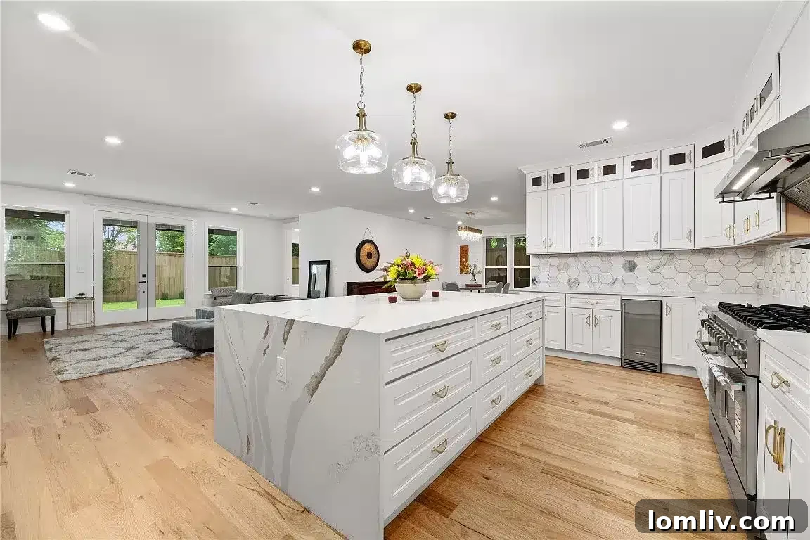 Kitchen with ceiling-high cabinets and island drawers for maximum storage
