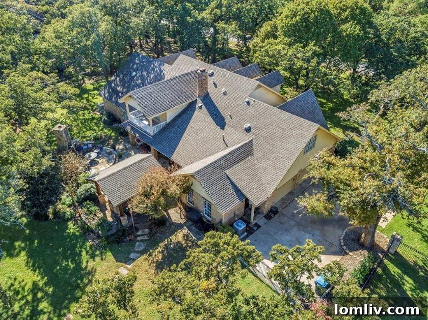 RE/MAX DFW Associates Liz Snowden Uncovers a Prime Flower Mound Property 15 Inviting outdoor seating area by the pool and spa, perfect for relaxation and entertainment