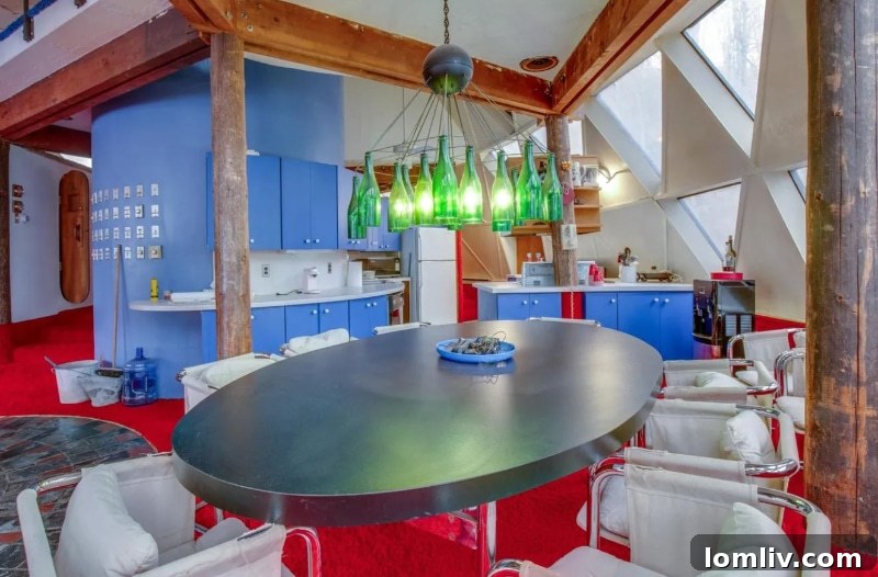 DIY wine bottle chandelier above a Formica table in a Vermont home