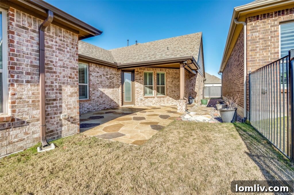 Spacious outdoor patio with seating, perfect for relaxation.