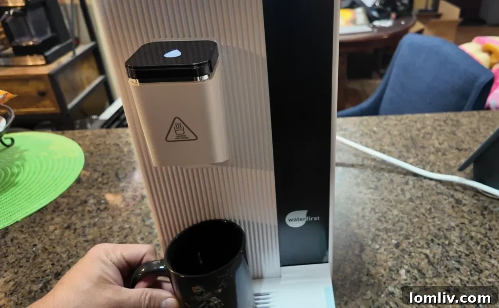 62 Lucrative Products Dominating 2024 Sales 21 A person using a portable water filter to drink from a natural stream