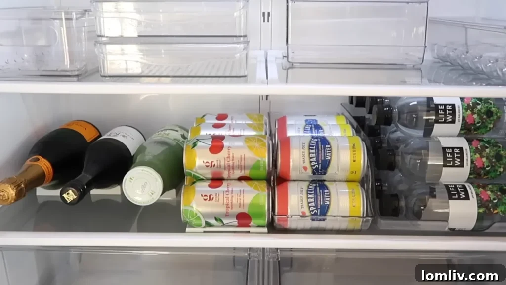 62 Lucrative Products Dominating 2024 Sales 29 A refrigerator neatly organized with clear, stackable bins