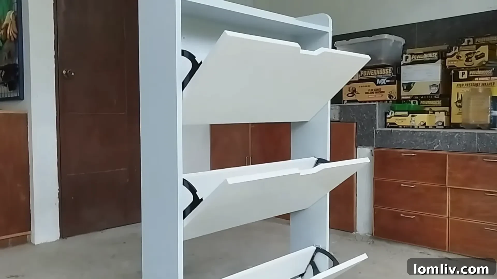 62 Lucrative Products Dominating 2024 Sales 33 A neat wall-mounted shoe rack keeping shoes off the floor in an entryway
