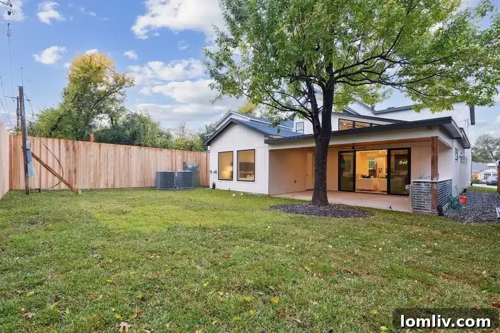 Dallas Designer Adriana Meyer Unveils Her Fabulous New Masterpiece 11 Spacious backyard with an outdoor kitchen, perfect for entertaining