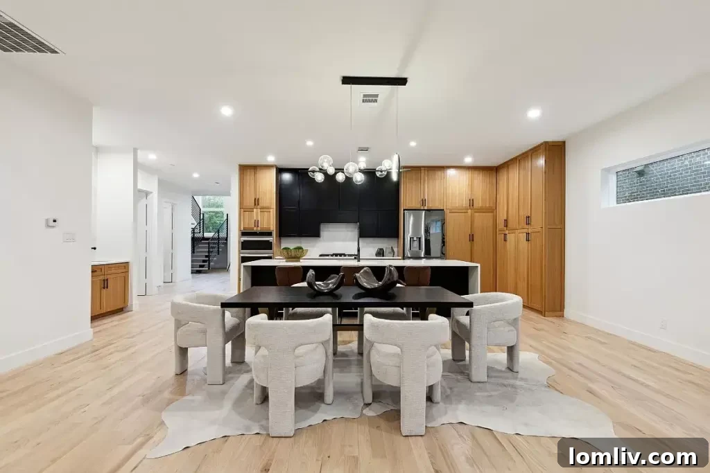 Dallas Designer Adriana Meyer Unveils Her Fabulous New Masterpiece 5 Elegant dining area seamlessly connected to the living space
