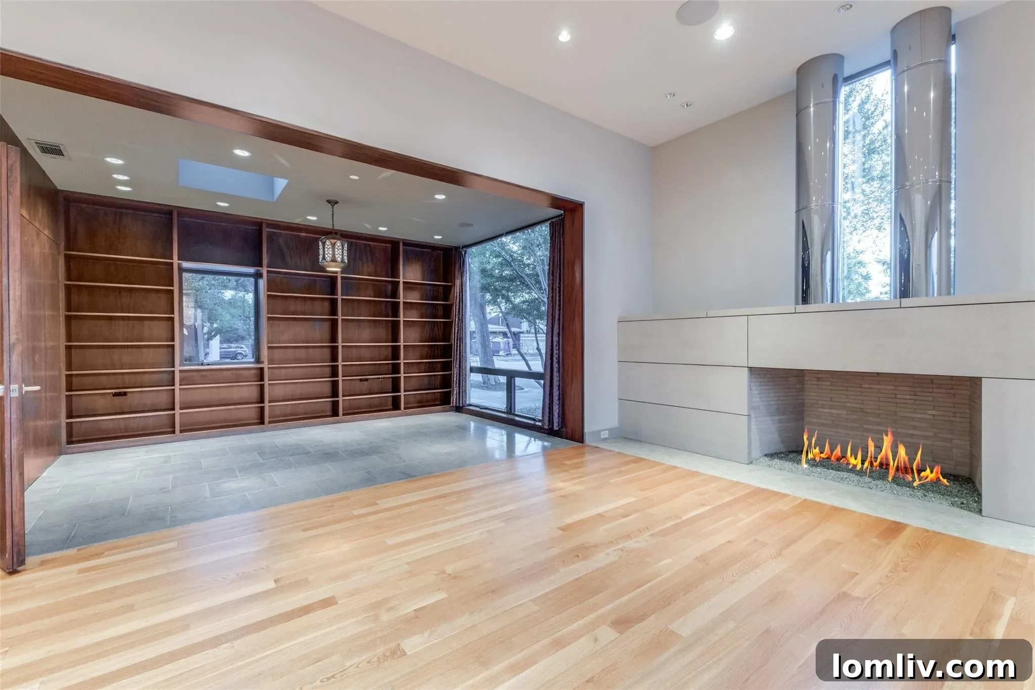 Modern interior hallway or living space with contemporary abstract art on the wall and natural light streaming in