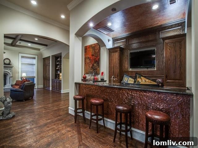 Gourmet kitchen with large granite island and high-end appliances