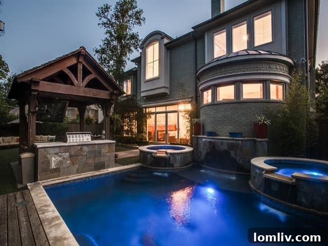 Expansive backyard with a luxurious waterfall feature