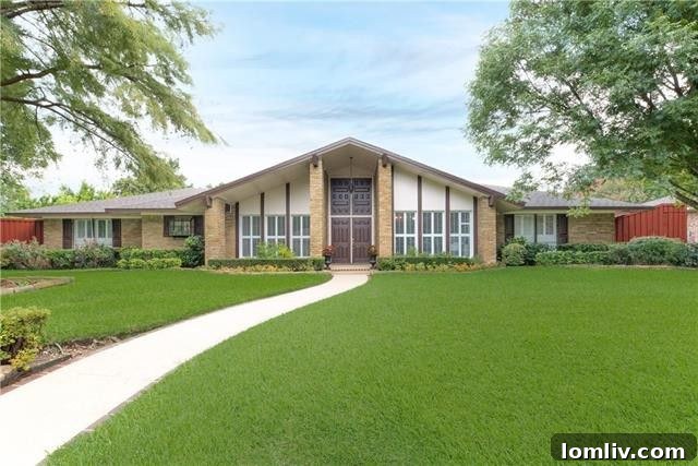 Exterior view of the luxury ranch-style home at 3823 Princess Ln, Disney Streets Dallas