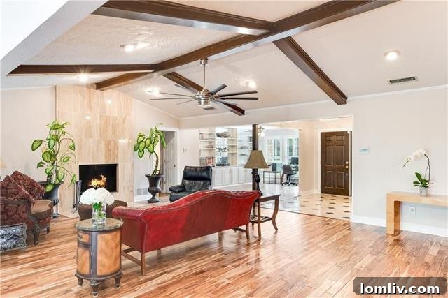 Spacious living room with vaulted ceilings and fireplace at 3823 Princess Ln