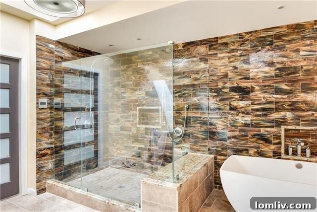 Luxurious master bathroom with soaking tub and dual vanities at 3823 Princess Ln