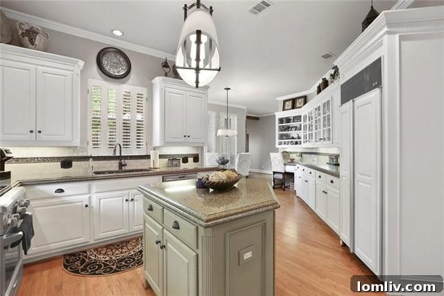 Spacious living area with fireplace and hardwood floors at 10812 Aladdin Dr