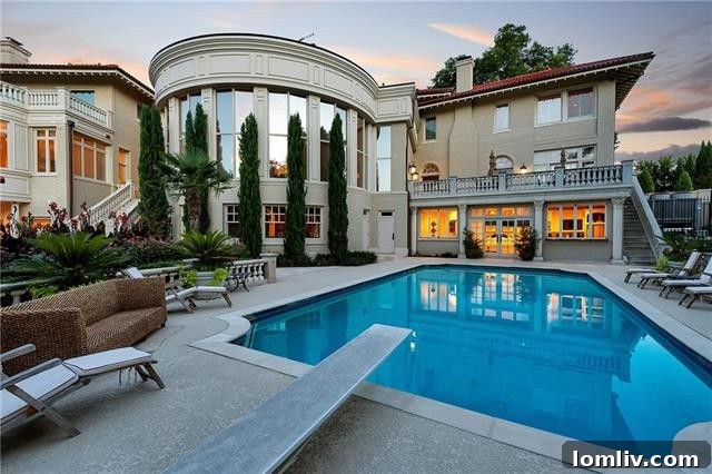 Outdoor kitchen area with grill and pizza oven