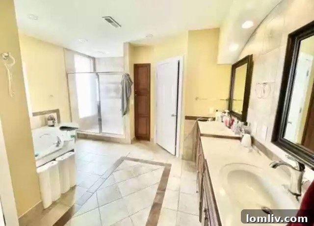 Bathroom in Tudor home with tub and unique storage solutions