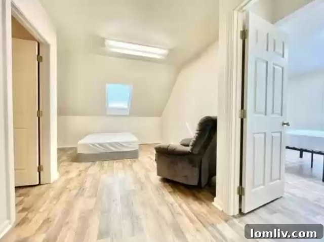 Unique transitional room in Tudor home connecting other bedrooms