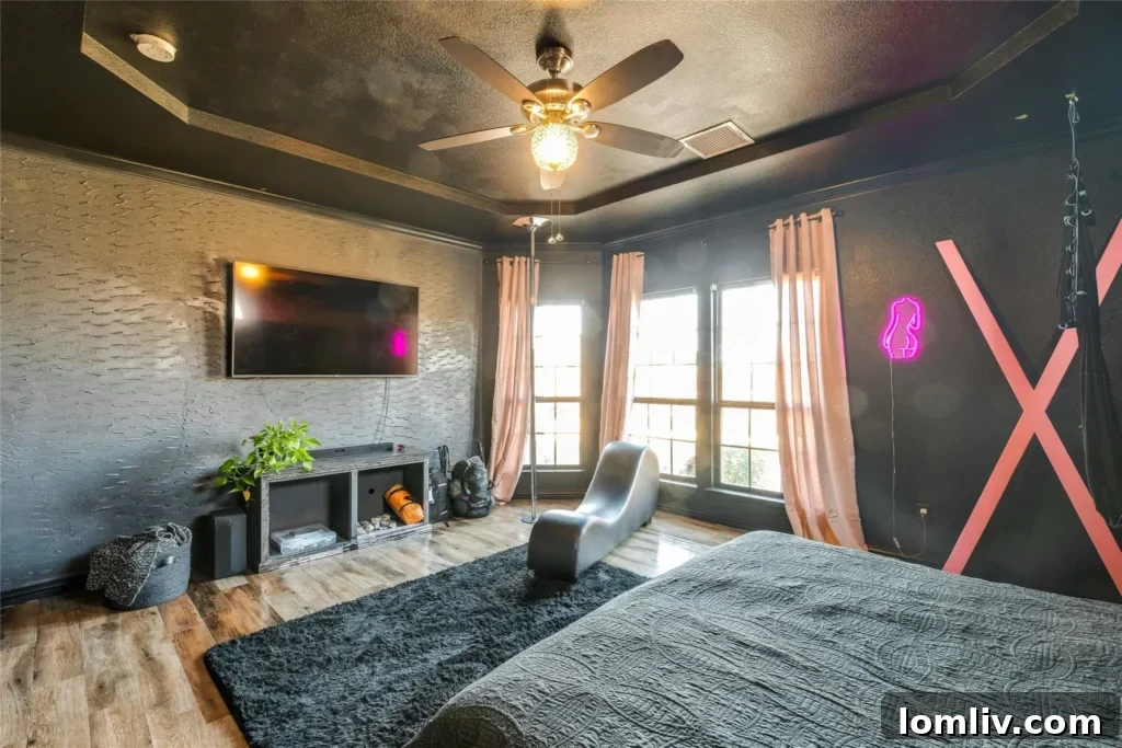 The uniquely appointed master bedroom of the Celina home, featuring a St. Andrew's Cross, which became the focal point of its viral fame.
