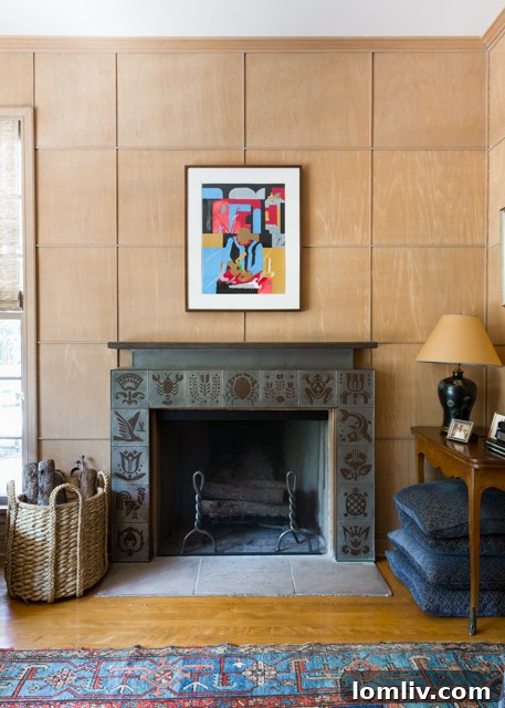Master sitting room fireplace with student-designed panels