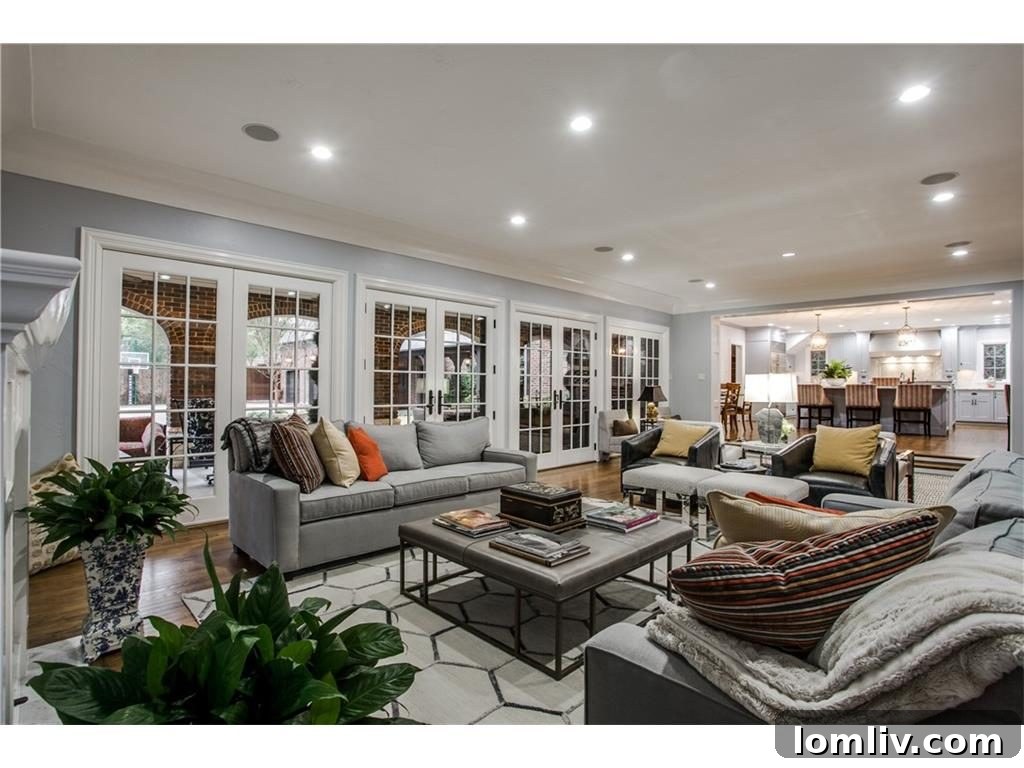 Luxurious family room with comfortable seating in the Charles Dilbeck designed home.