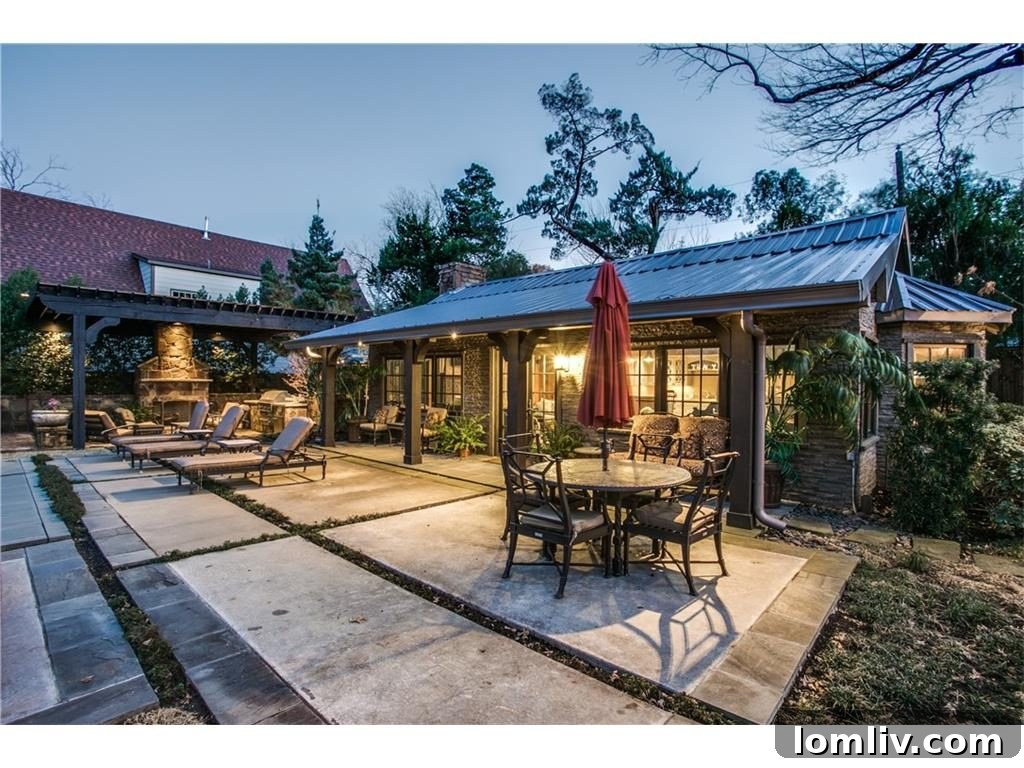 Luxurious pool cabana with an outdoor kitchen, perfect for entertaining guests.