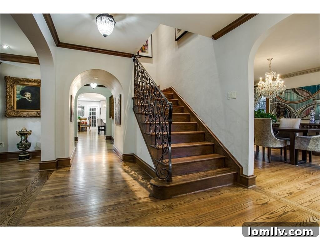 Interior staircase of the Iconic Lakewood Estate by Charles Dilbeck, showcasing architectural details.