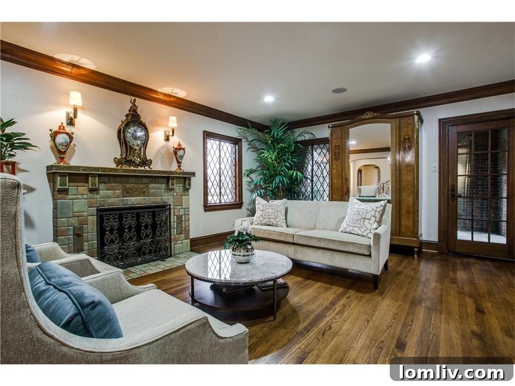 Formal living room with an original Rookwood Fireplace, a centerpiece of the Lakewood estate.