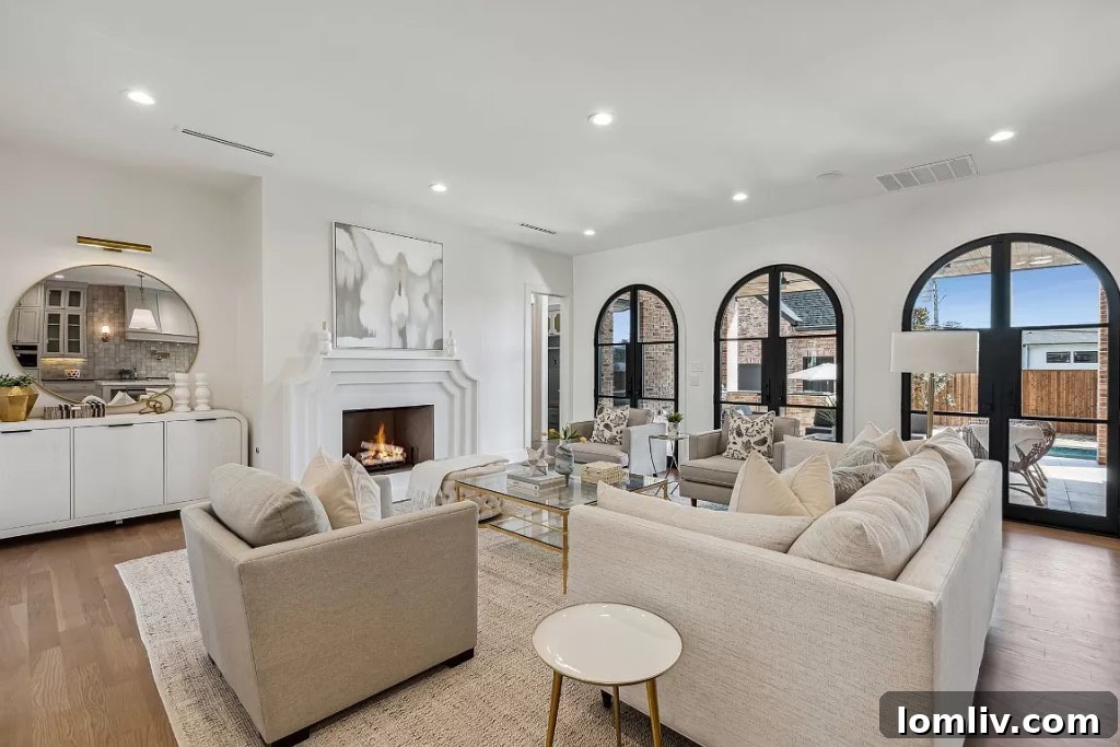 Lakewood'da Ustalığın Doruk Noktası: Gramercy Custom Homes 4 Elegant interior with arched doorways and abundant natural light