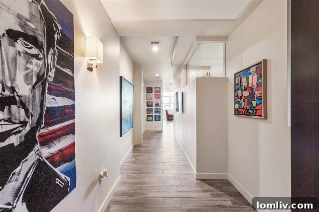 Montgomery Plaza Condos: Unbeatable Location, Unwavering Demand 6 Spacious entry hallway of Unit 2418 at Montgomery Plaza, ideal for art display and offering abundant natural light.