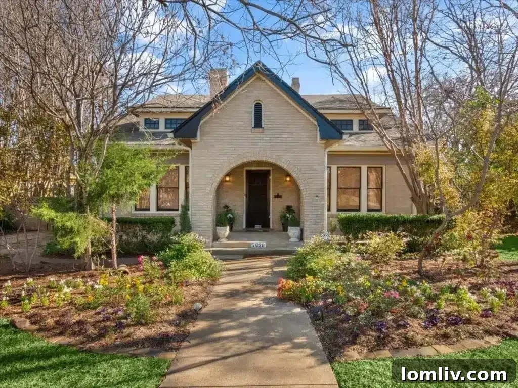 This Junius Heights Prairie-Style Home's Original Details Are A Vintage Lover's Dream 2 Historic Junius Heights Prairie-style home exterior in Dallas, showcasing its well-preserved architectural details.