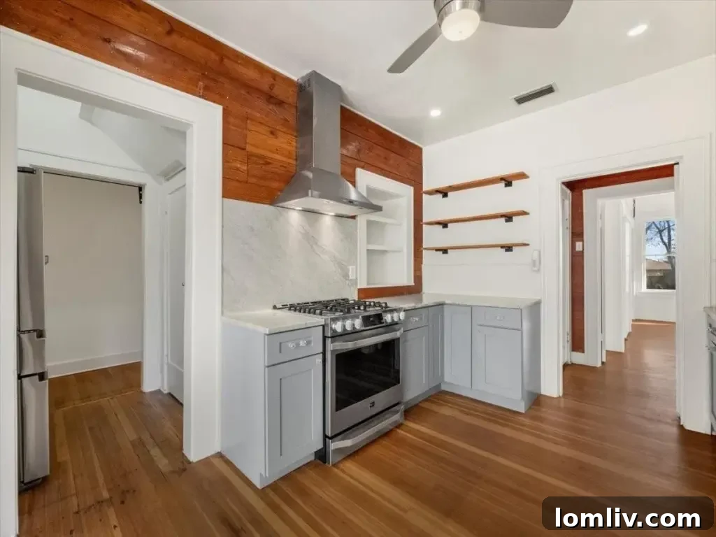 This Junius Heights Prairie-Style Home's Original Details Are A Vintage Lover's Dream 6 Bright and airy dining area, featuring classic architectural details and natural light.