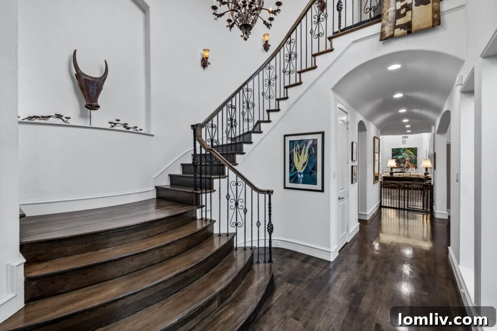 Grand entrance hall with staircase and elevated office