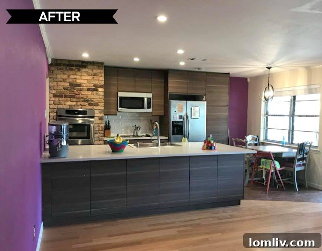 The newly renovated kitchen and open den area, featuring modern appliances and quartz countertops.
