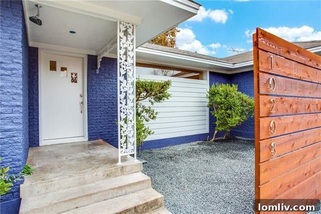 A Blue House For Keeps 2 Stunning cobalt blue exterior of the fully renovated mid-century modern home at 10208 San Lorenzo Drive, East Dallas
