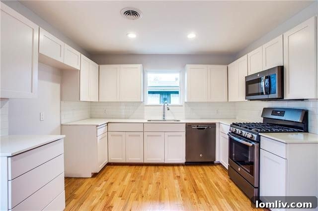 Inviting backyard featuring a newly built wooden deck perfect for entertaining or relaxation